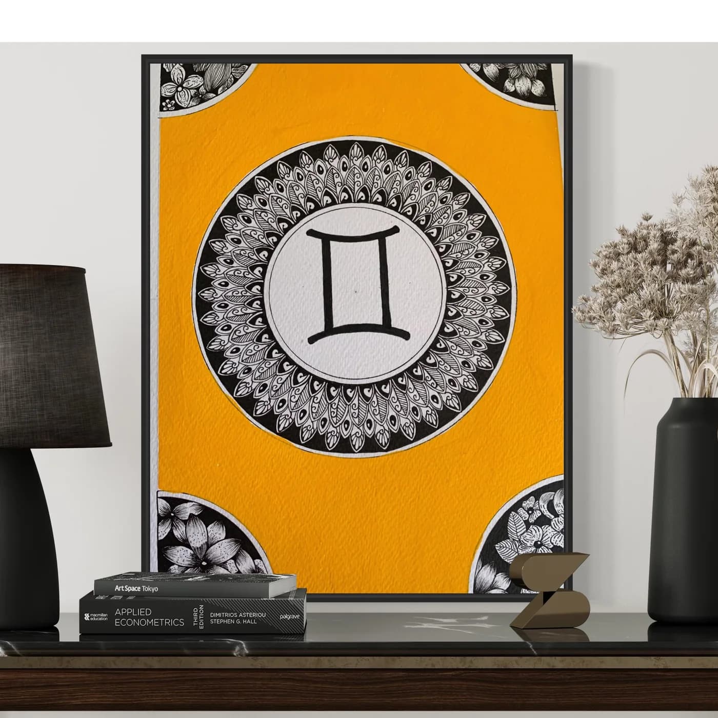 Gemini sign in a mandala on a yellow background